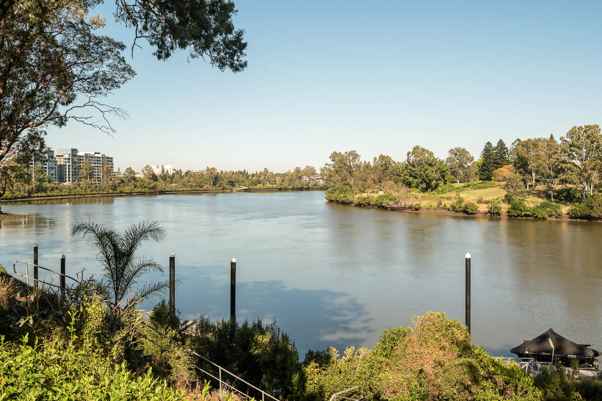 Established gardens running down to the river