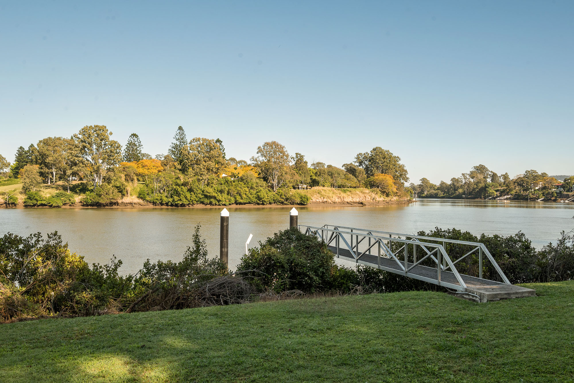 Private pontoon and broad waterfront lawn